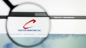 A magnifying glass zooms in on the website for Castor Maritime (CTRM).