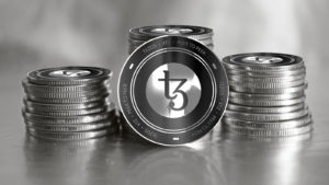 Tezos (XTZ) digital crypto currency. Stack of black and silver coins. Cyber money. 3D Render.
