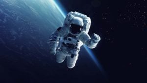 A concept art of an astronaut with a space secene behind. Space Stocks