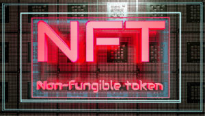 A red neon sign spelling out "NFT" and "non-fungible token".