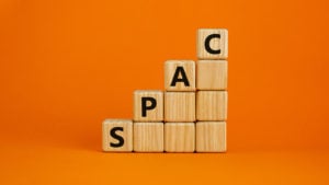 A picture of a series of cubes stacked up to get taller as they go to the right, with the word SPAC on them. IPOF is a SPAC.