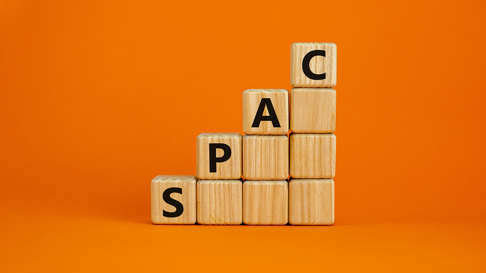 PAFO Stock. A picture of a series of cubes stacked up to get taller as they go to the right, with the word SPAC on them. IPOF is a SPAC.