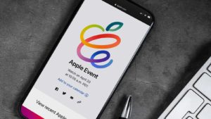 The logo for the April 2020 Spring Loaded Apple Event is pictured on an iPhone.