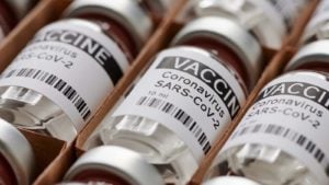 A bunch of glass vials of SARS-CoV-2 vaccines.