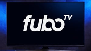 Flat-screen TV set displaying logo of FuboTV, an American streaming television service that focuses primarily on channels that distribute live sports