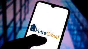the PulteGroup logo seen displayed on a smartphone