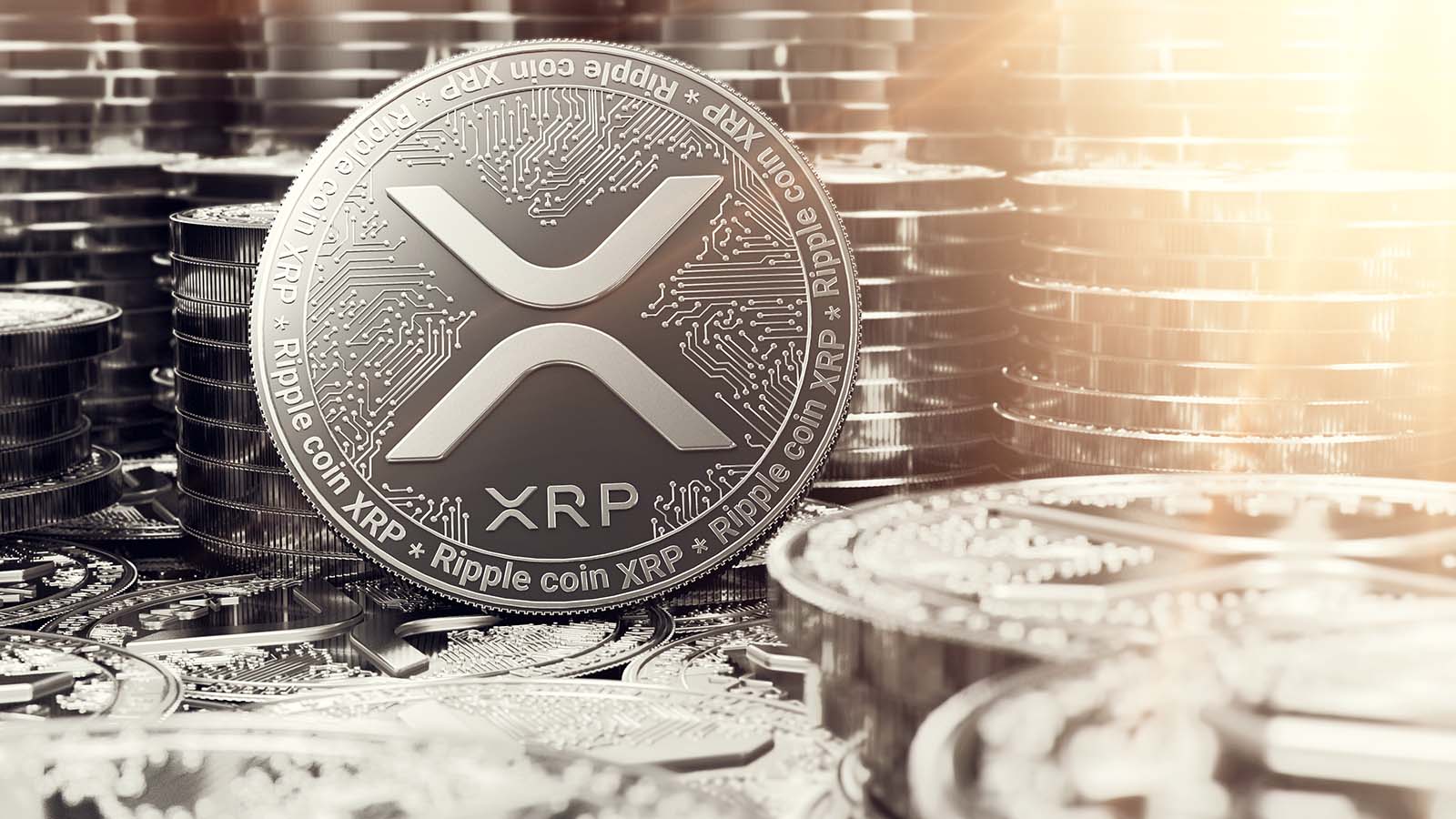 A concept token for XRP (XRP) with stacks of tokens in the background.