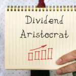 Dividend Aristocrats phrase on the sheet. Dividend investing