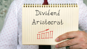 Dividend Aristocrats phrase on the sheet. Dividend Aristocrat Stocks