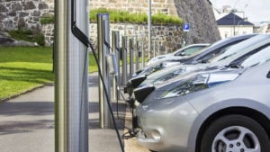 electric vehicles at a recharging station representing why EV stocks are down today.