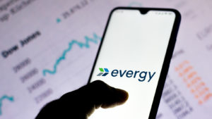 the Evergy logo seen displayed on a smartphone EVRG stock