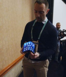 Matt McCall holding a foldable smartphone