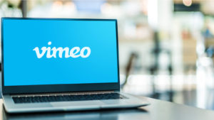 VMEO stock: A laptop on a desk displaying the Vimeo logo