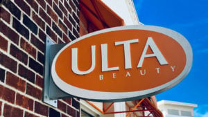 stocks to watch ULTA stock Ulta Beauty store front sign located at Laurel Town Centre in Laurel, Maryland.