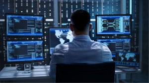 Man sitting in front of a computer