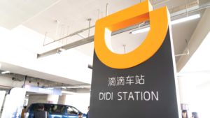 A sign for a Didi (DIDI) ride-hailing station.
