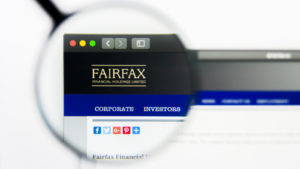A magnifying glass is focused on the logo for Fairfax Financial Holdings on the company's website.