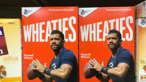 Wheaties cereal boxes on display featuring quarterback Russell Wilson.
