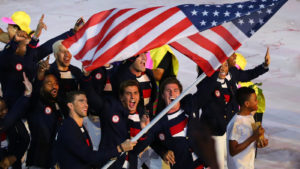 Olympic champion Michael Phelps carrying the United States flag leading the Olympic team USA in the Rio 2016 Opening Ceremony at Maracana Stadium