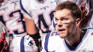 A close-up shot of Tom Brady in his New England Patriots uniform.