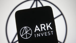 Image of the Ark Invest Logo on a smartphone.
