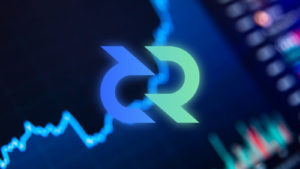 The logo for the Decred cryptocurrency network is seen in front of a chart representing price changes over time.