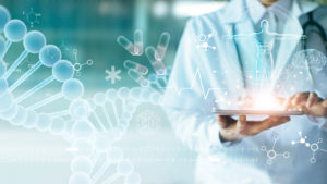 Various graphic representations of medical images are shown in front of a doctor using a tablet.  DNA stock