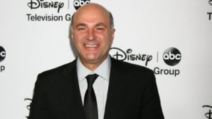 Kevin O'Leary smiles at an event