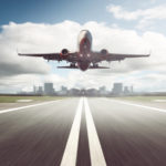 a jet takes off on a clear runway.