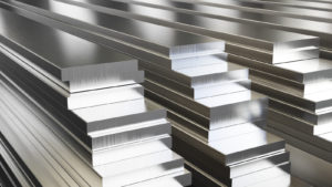 stacks of rectangular aluminum metal stock