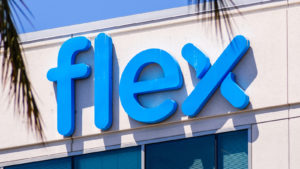 The logo for the company Flex is seen on the side of a building.