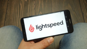 The Lightspeed Commerce logo on a smartphone representing LSPD stock.