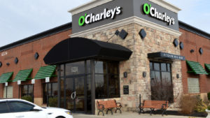 A photograph of the front of an O'Charley's restaurant.