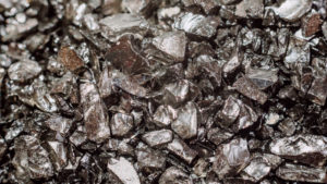 UURAF stock: a close up shot of a pile of rare earth metals