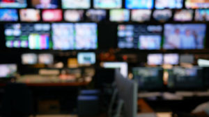 A blurred image of a television studio