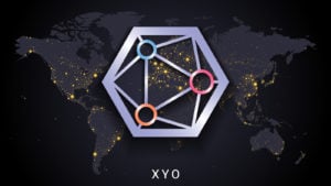 Xyo crypto currency digital payment system blockchain concept. Cryptocurrency isolated on earth night lights world map background. Vector illustration