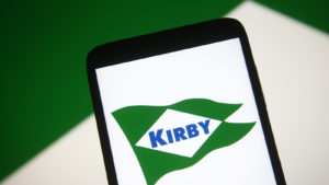The logo for Kirby Corporation is displayed on a cellphone.