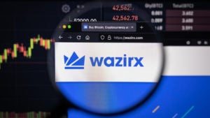 WazirX (WRX-USD) logo on a website with a price chart in the background