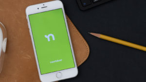 Image of the Nextdoor (KIND Stock) app on an iPhone.