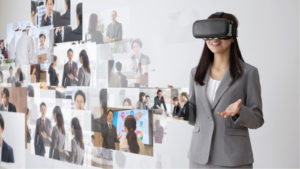 A concept image of a woman in business attire wearing a VR helmet with various images of meetings in front of her.
