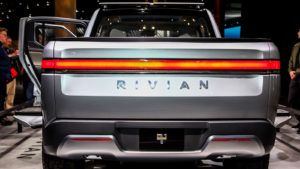 The back of a silver Rivian (RIVN stock news) pick-up truck.