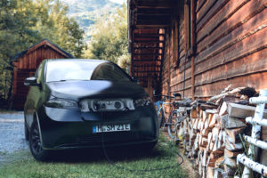 A picture of sono motors electric vehicle plugged in