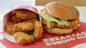 A photo of a Wendy's chicken sandwich and chicken nuggets.