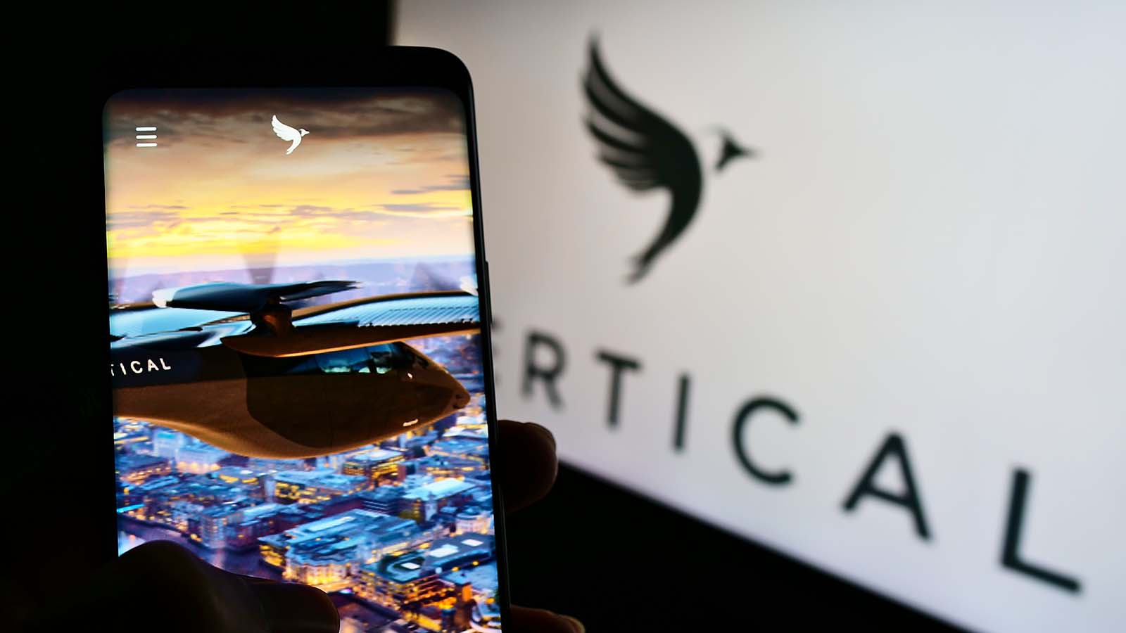 The logo for Vertical Aerospace (EVTL stock) displayed on a smartphone screen.