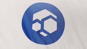 The logo of the Flux cryptocurrency (FLUX) on a white piece of cloth.