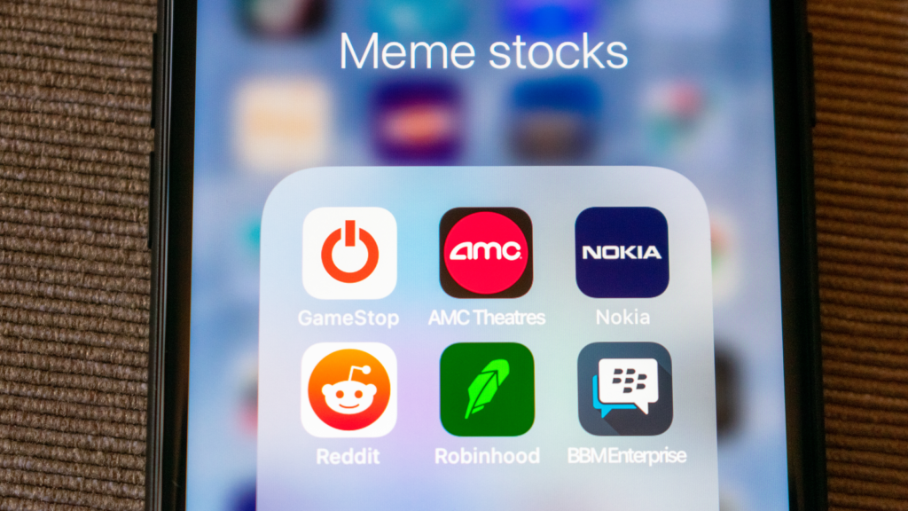 Several meme stocks apps on a smartphone.