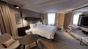 An image of a bedroom traced with white abstract lines