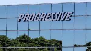 A photo of the Progressive logo on the side of a building.