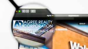 Agree Realty Corporation (ADC) logo visible on display screen.