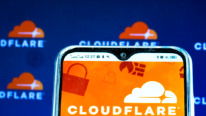 An illustration of a Cloudflare (NET) logo displayed on a smartphone